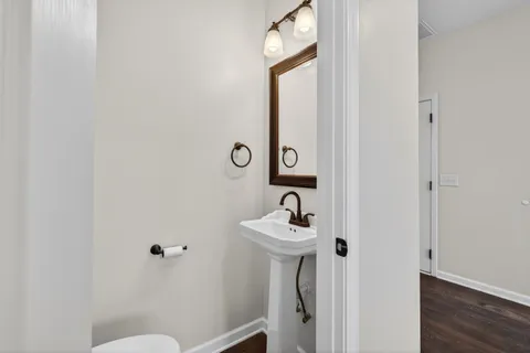 a bathroom with a sink and mirror