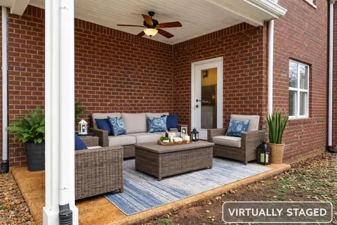 a building outdoor space with patio furniture