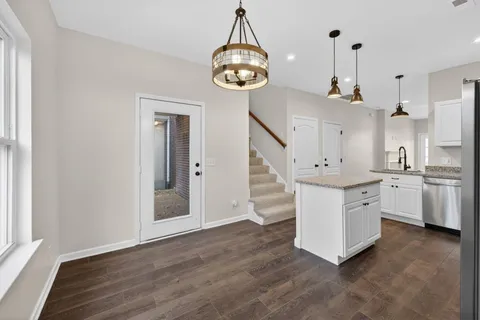 a very nice looking room with a chandelier