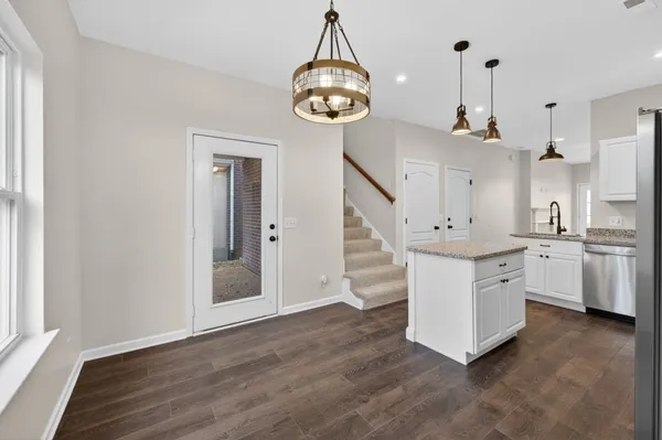 a very nice looking room with a chandelier