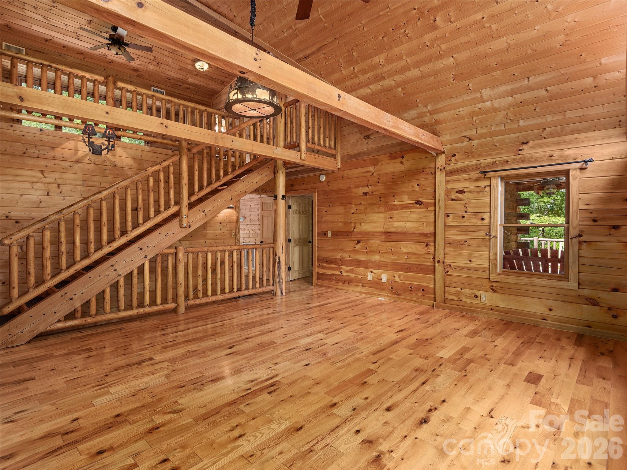 413 Green Hills Road Mill Spring, NC 28756 - Photo 8 of 48 a view of entryway with wooden floor