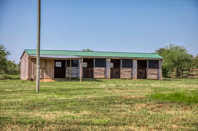 a house view with a garden space
