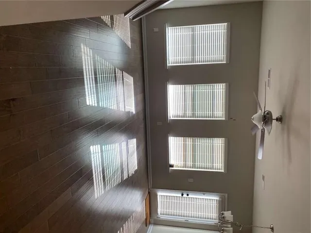 a view of a projector room with projector and screen