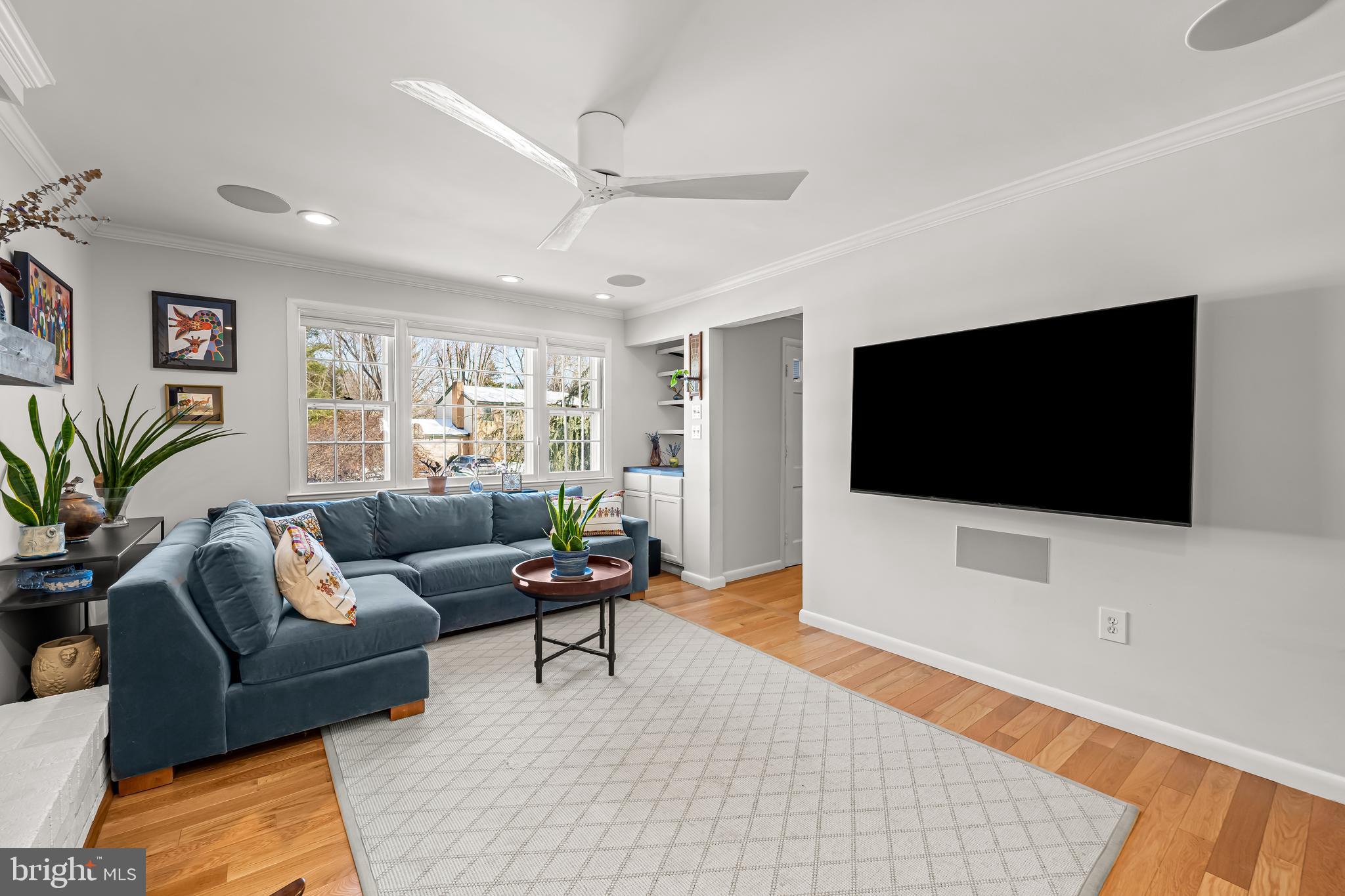 3407 Birch Hollow Road Baltimore, MD 21208 - Photo 26 of 47 a living room with furniture and a flat screen tv
