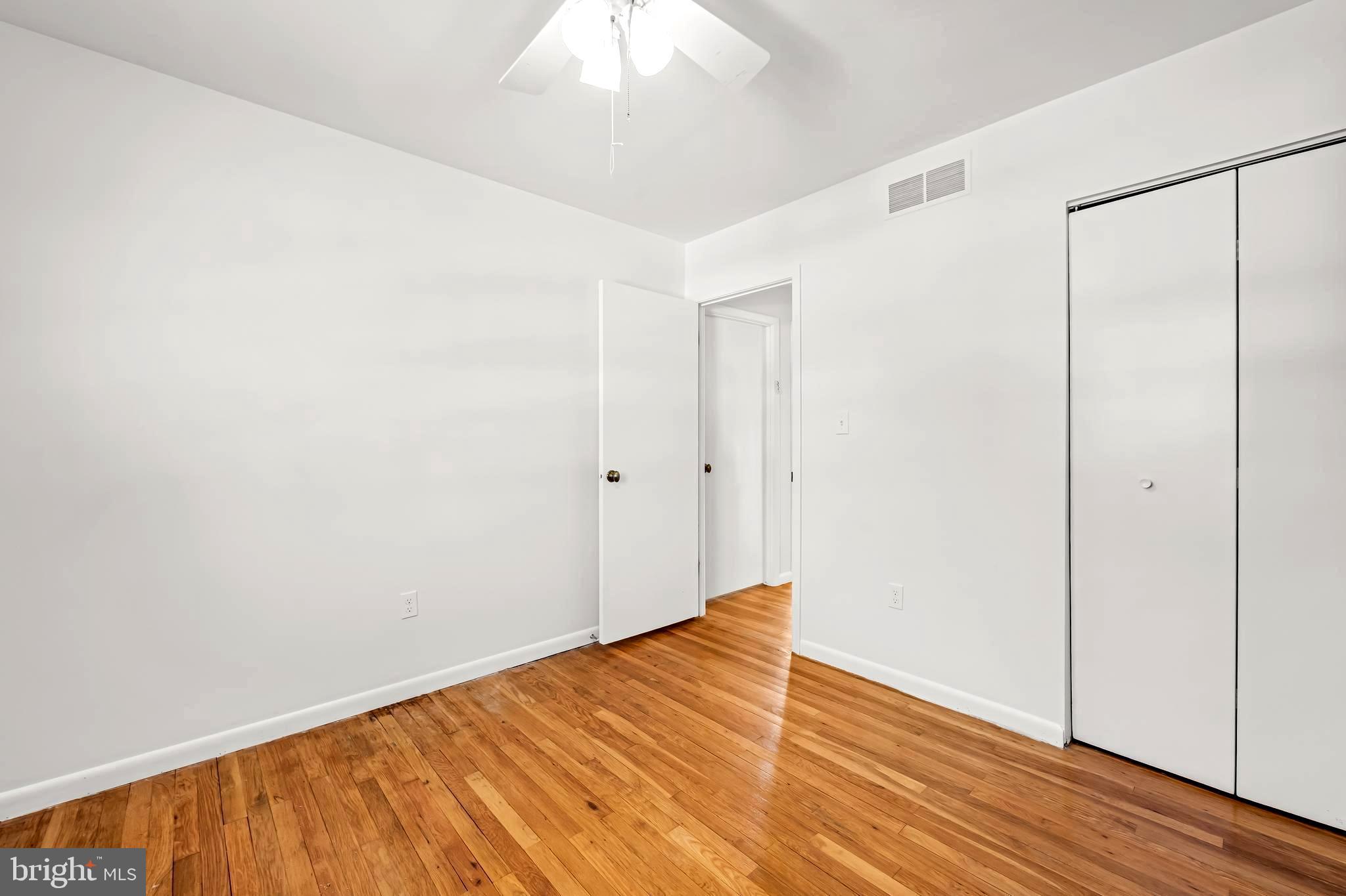 3407 Birch Hollow Road Baltimore, MD 21208 - Photo 36 of 47 a view of a room with wooden floor