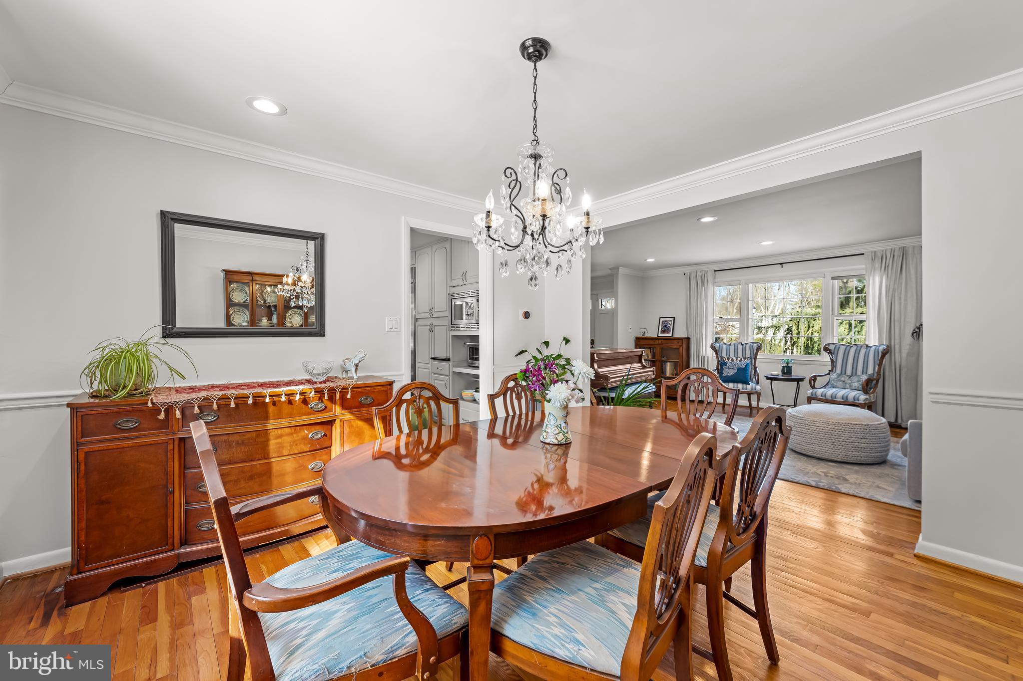 3407 Birch Hollow Road Baltimore, MD 21208 - Photo 10 of 47 a view of a dining room with furniture and wooden floor