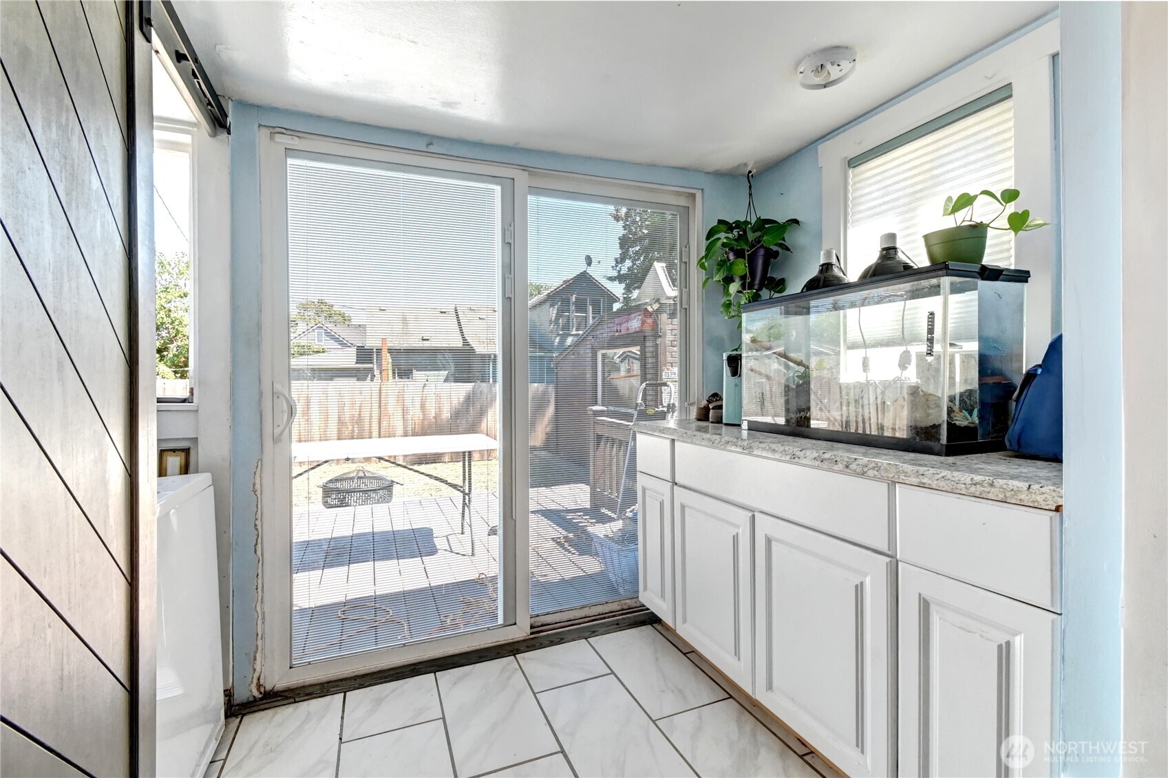2327 Harrison Avenue Everett, WA 98201 - Photo 14 of 21 a open kitchen with stainless steel appliances granite countertop a refrigerator and a sink