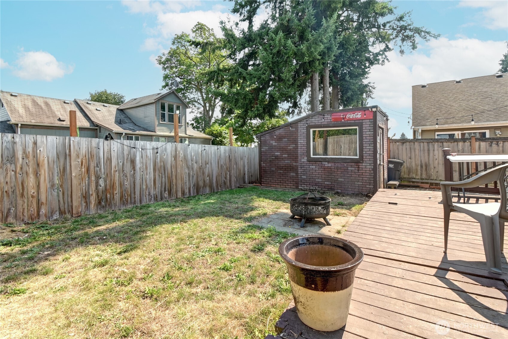2327 Harrison Avenue Everett, WA 98201 - Photo 17 of 21 a backyard of a house with table and chairs