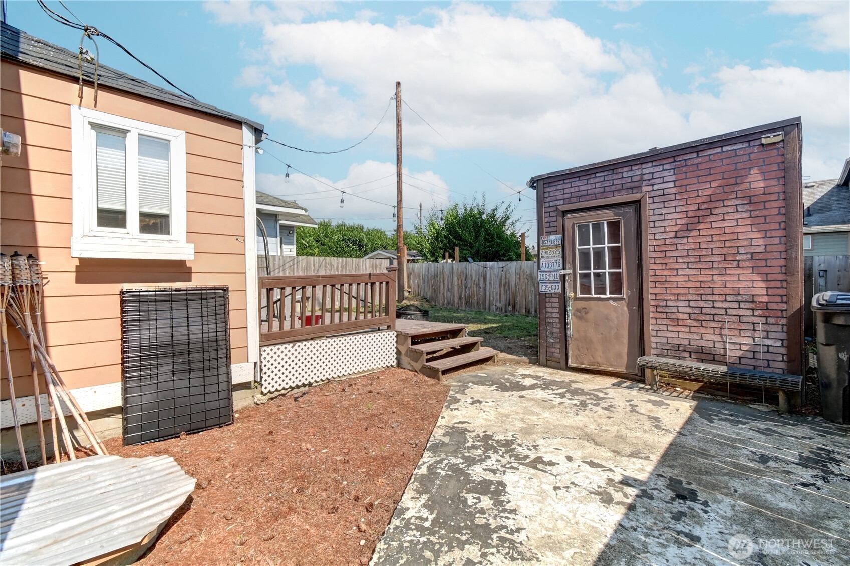 2327 Harrison Avenue Everett, WA 98201 - Photo 20 of 21 a bench is sitting in front of a house