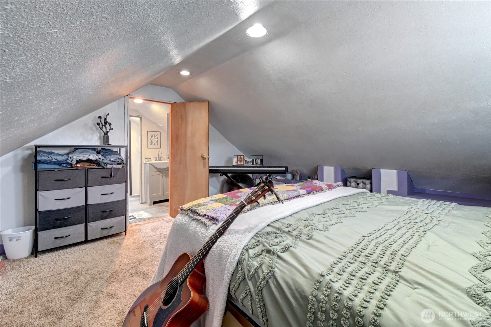 2327 Harrison Avenue Everett, WA 98201 - Photo 8 of 21 a bedroom with a bed and dresser