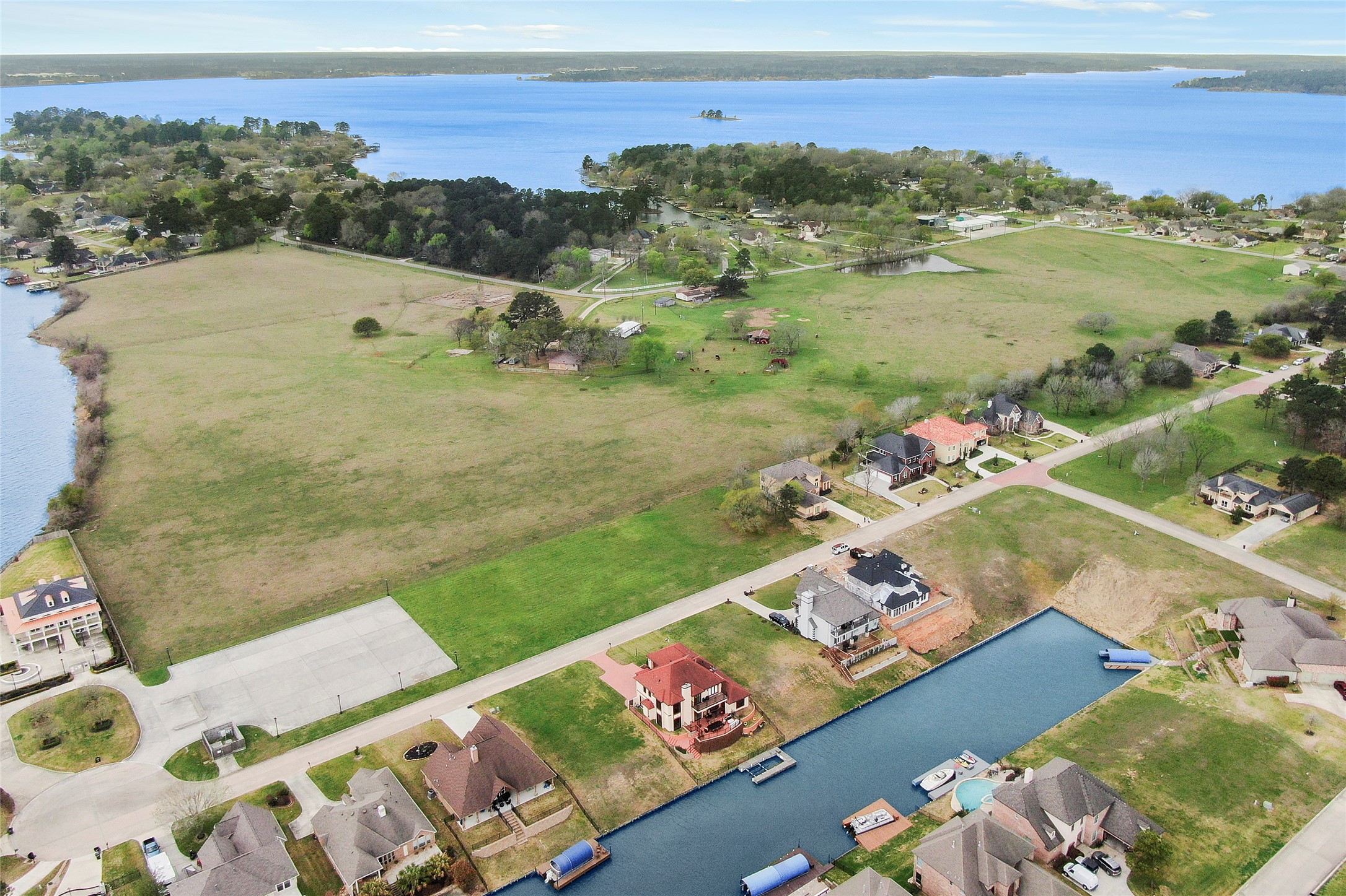 13036 Bruce Road Willis, TX 77318 - Photo 5 of 5 an aerial view of a house with a yard