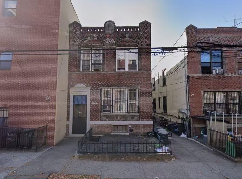 a front view of a house with a garage