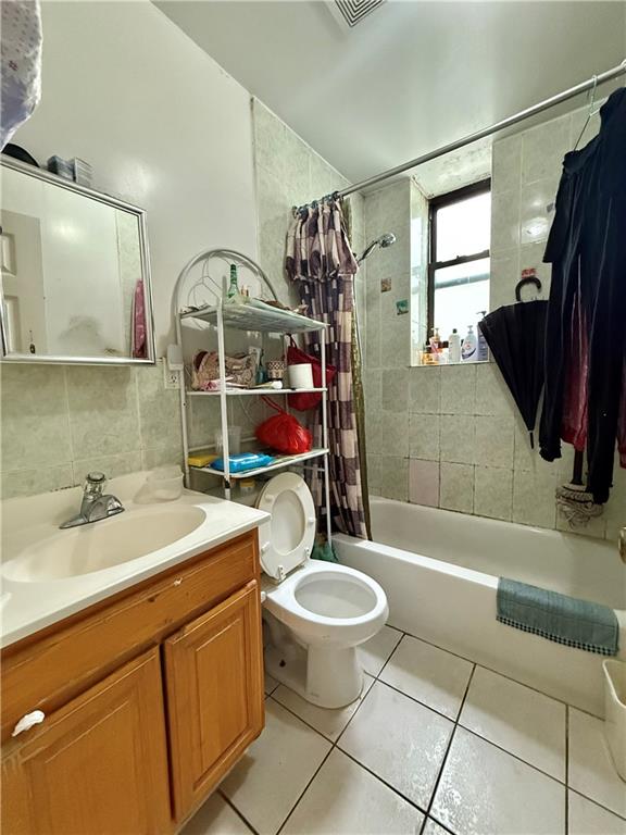 746 68th Street Brooklyn, NY 11220 - Photo 2 of 12 a bathroom with a sink a toilet and shower
