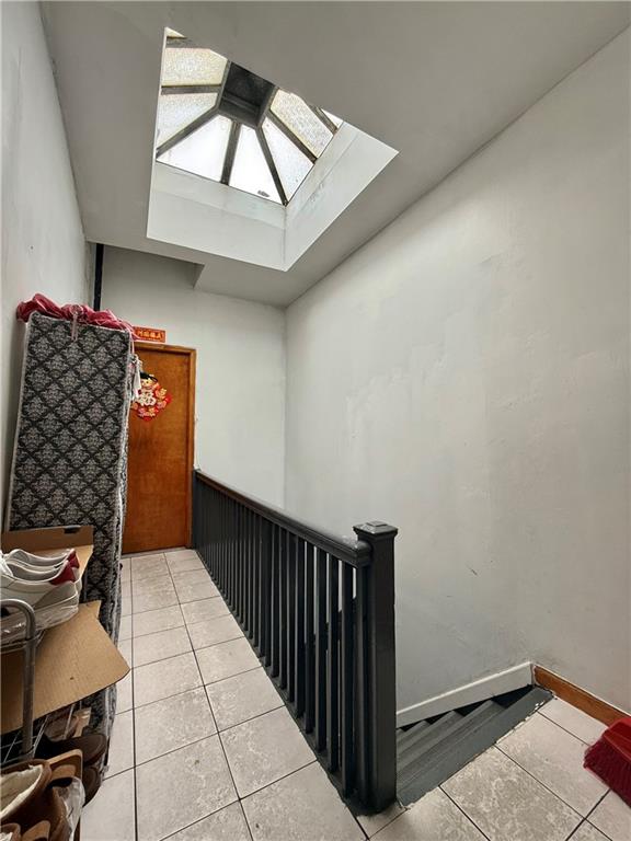 746 68th Street Brooklyn, NY 11220 - Photo 6 of 12 a view of a hallway with staircase