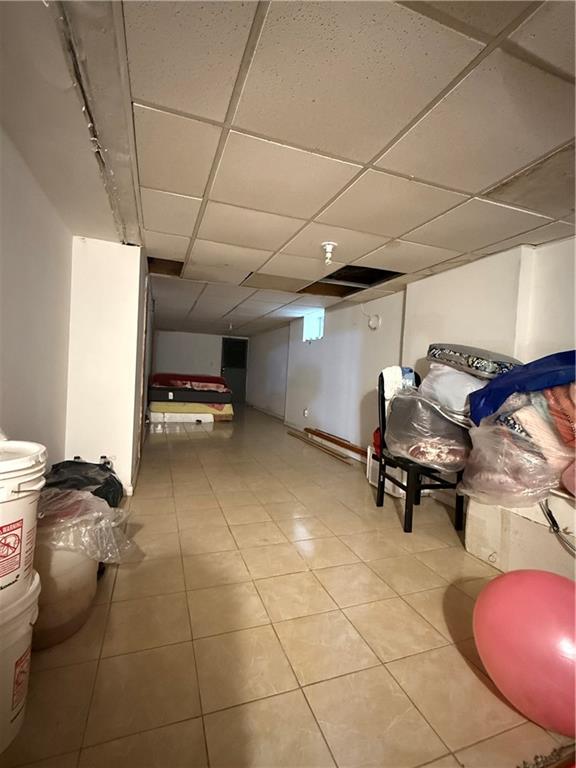 746 68th Street Brooklyn, NY 11220 - Photo 7 of 12 a view of a room with gym equipment