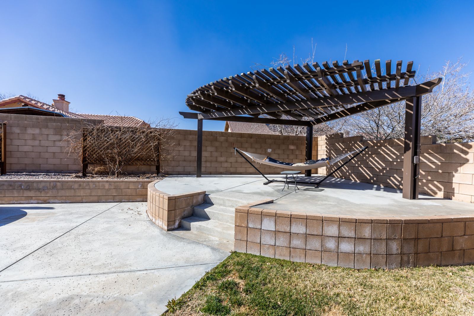 1219 Carolyn Street Ridgecrest, CA 93555 - Photo 41 of 47 a view of a patio with a table and chairs