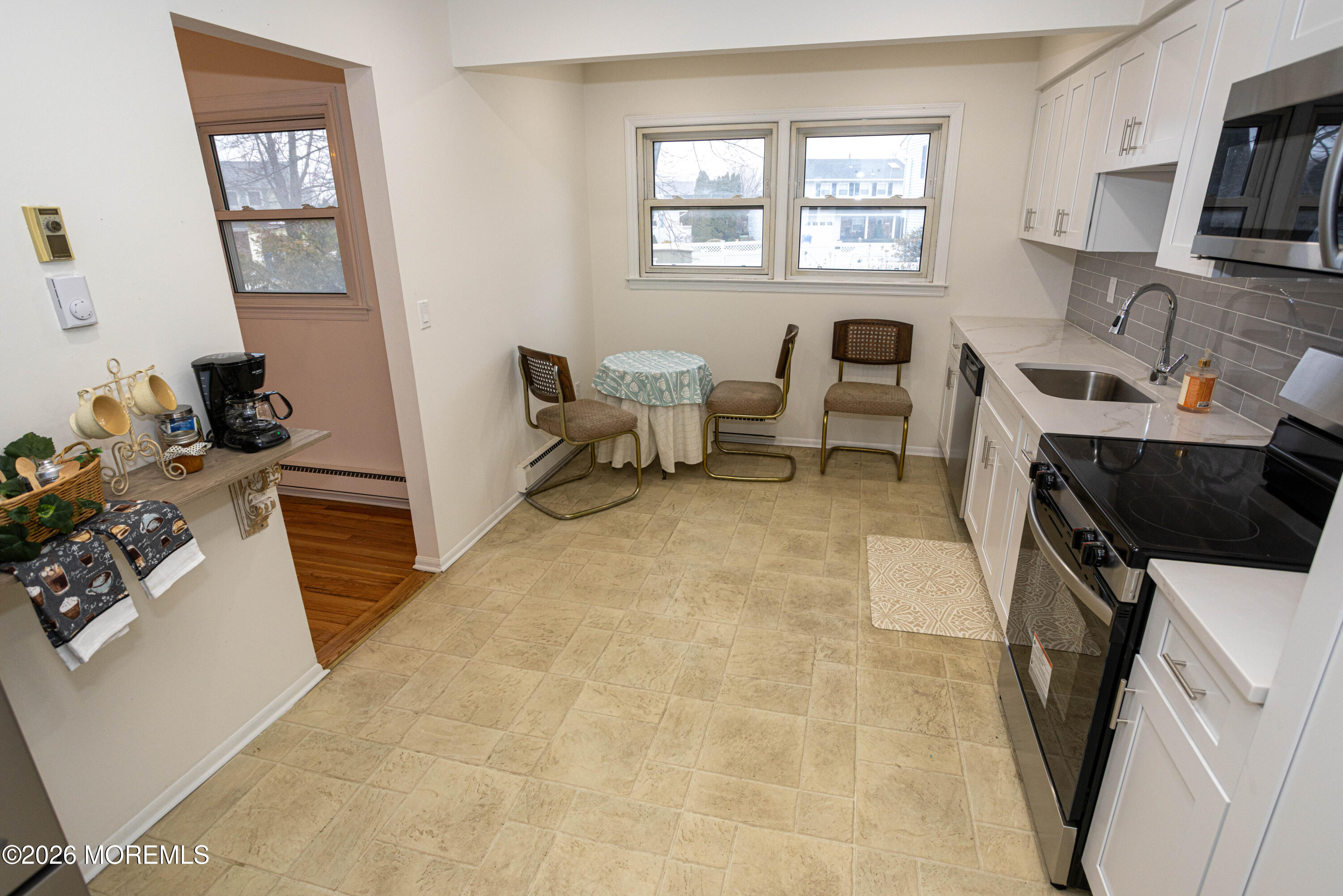 21 Sherwood Road Parlin, NJ 08859 - Photo 16 of 41 a living room with furniture a rug and a window