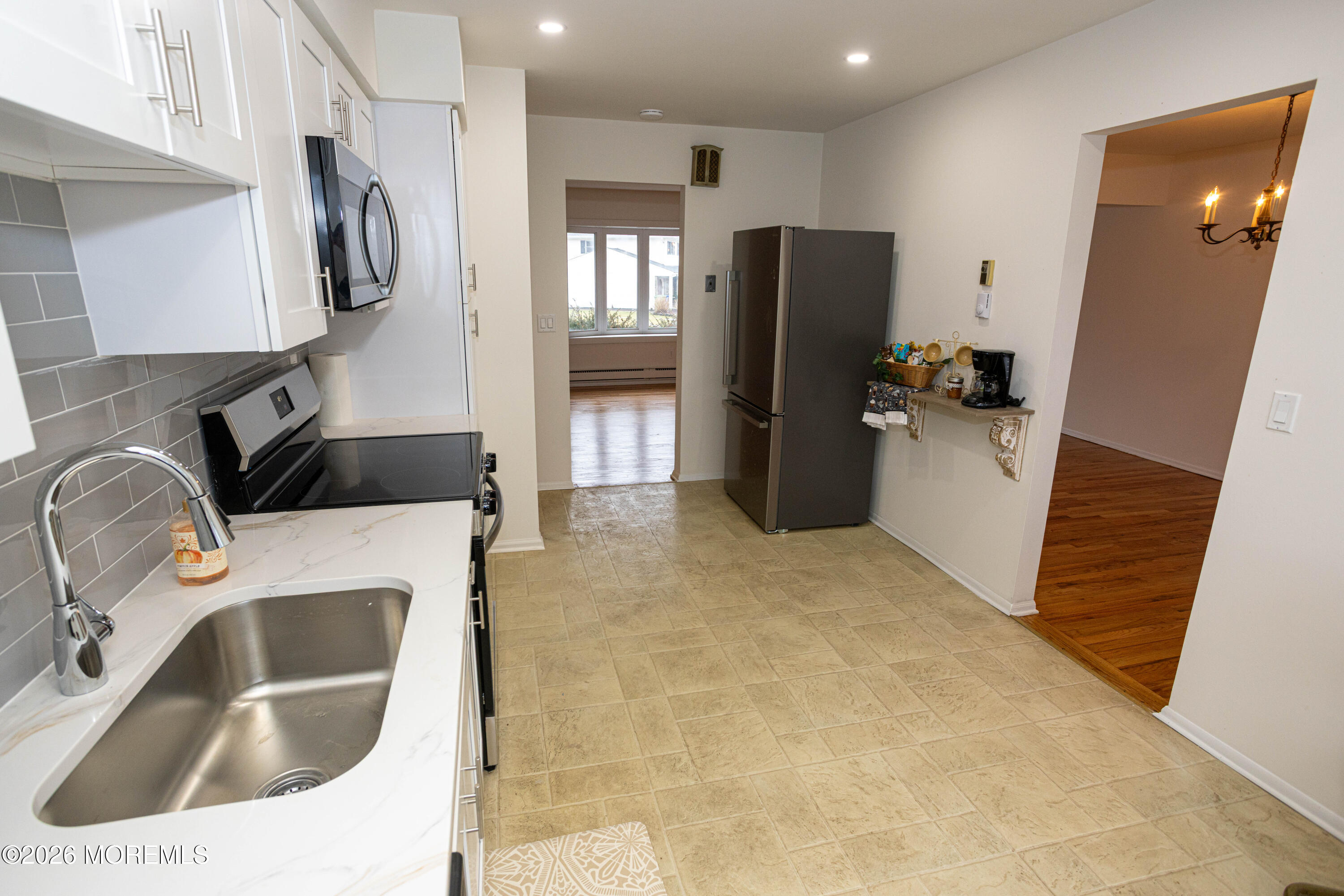 21 Sherwood Road Parlin, NJ 08859 - Photo 17 of 41 a kitchen with a refrigerator and a sink