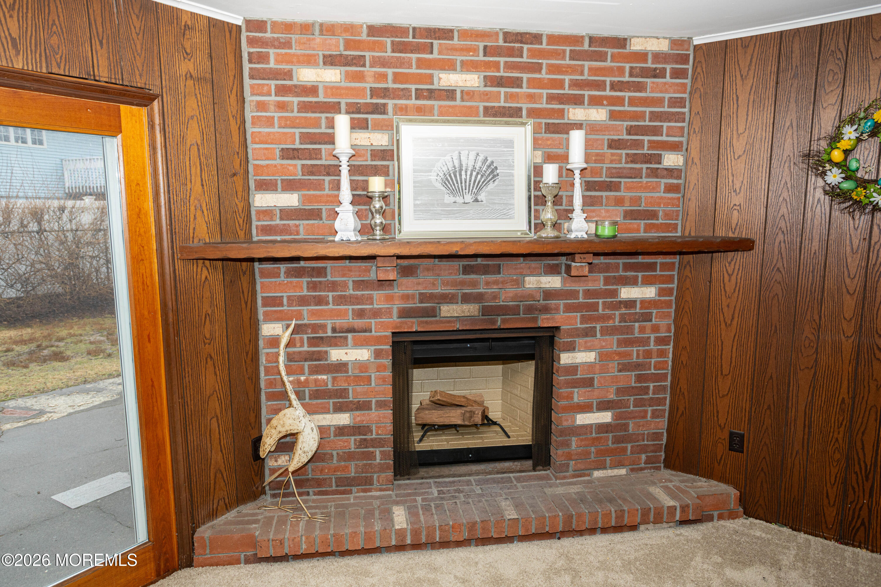 21 Sherwood Road Parlin, NJ 08859 - Photo 23 of 41 a living room with a fireplace and a window
