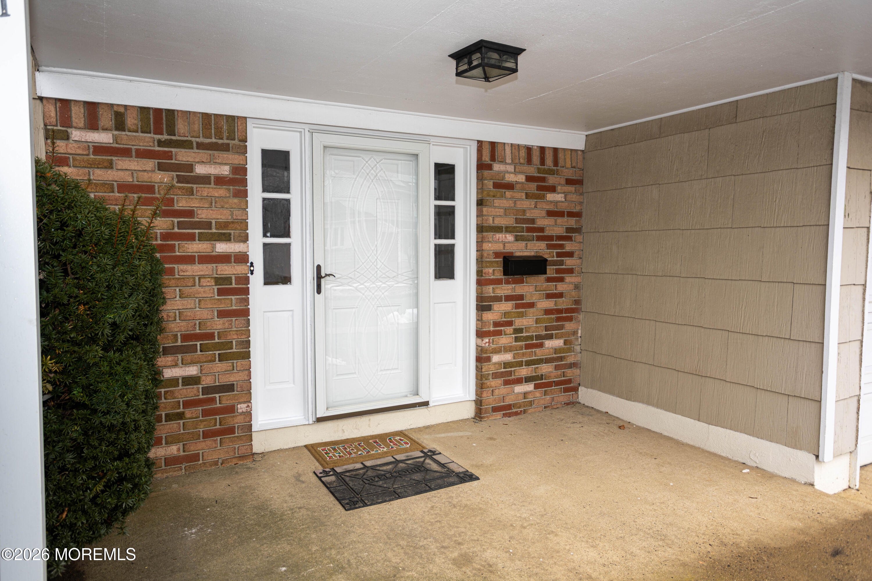 21 Sherwood Road Parlin, NJ 08859 - Photo 3 of 41 a view of an empty room with a empty space and garage