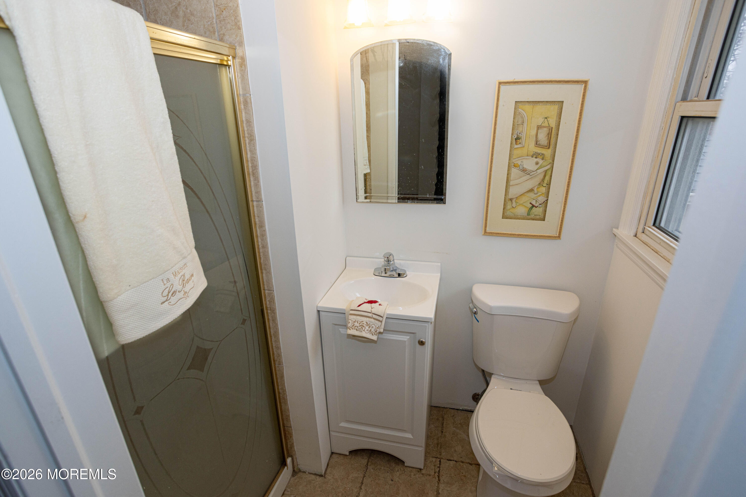 21 Sherwood Road Parlin, NJ 08859 - Photo 32 of 41 a white toilet sitting next to a bathroom sink