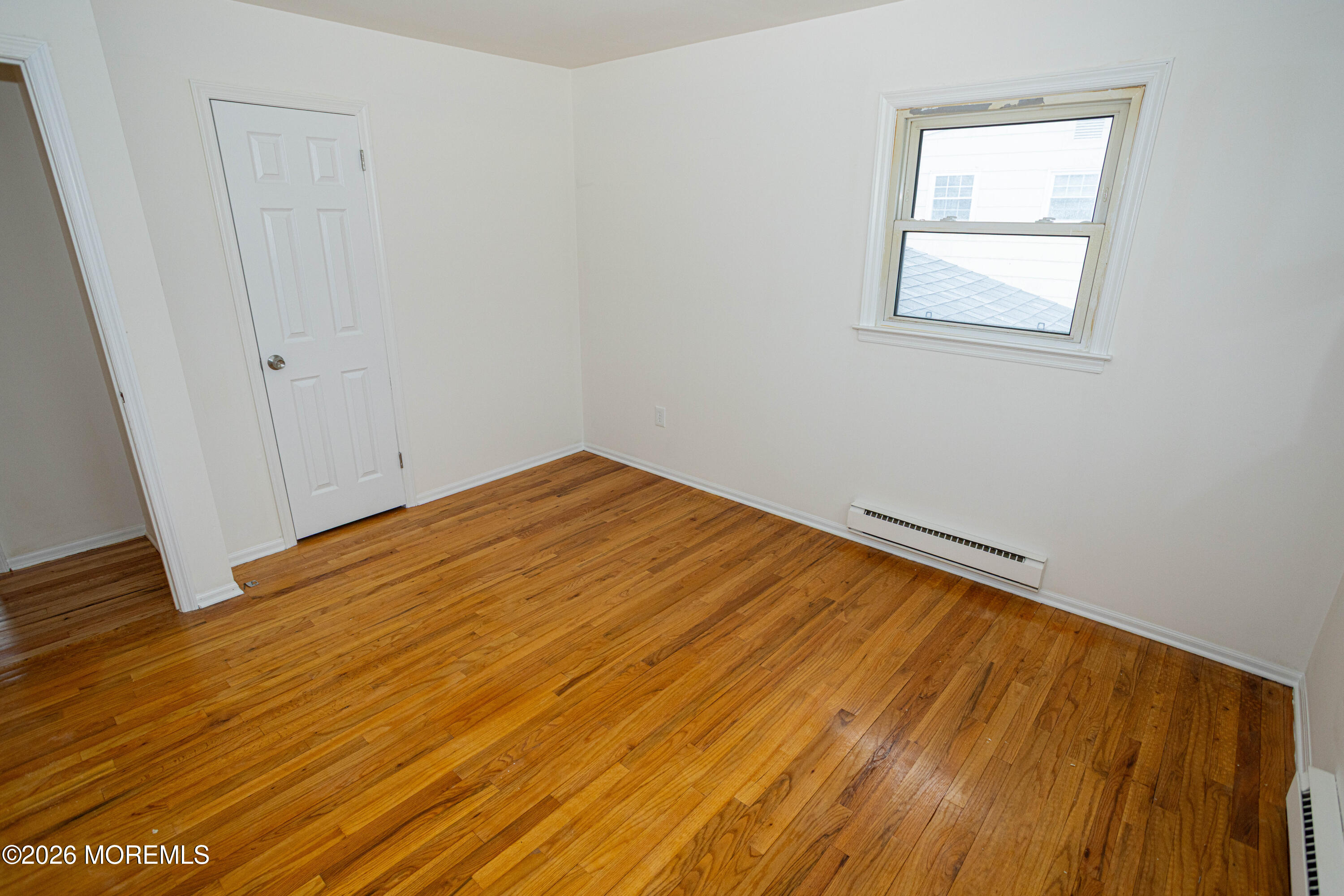 21 Sherwood Road Parlin, NJ 08859 - Photo 34 of 41 a view of empty room with wooden floor