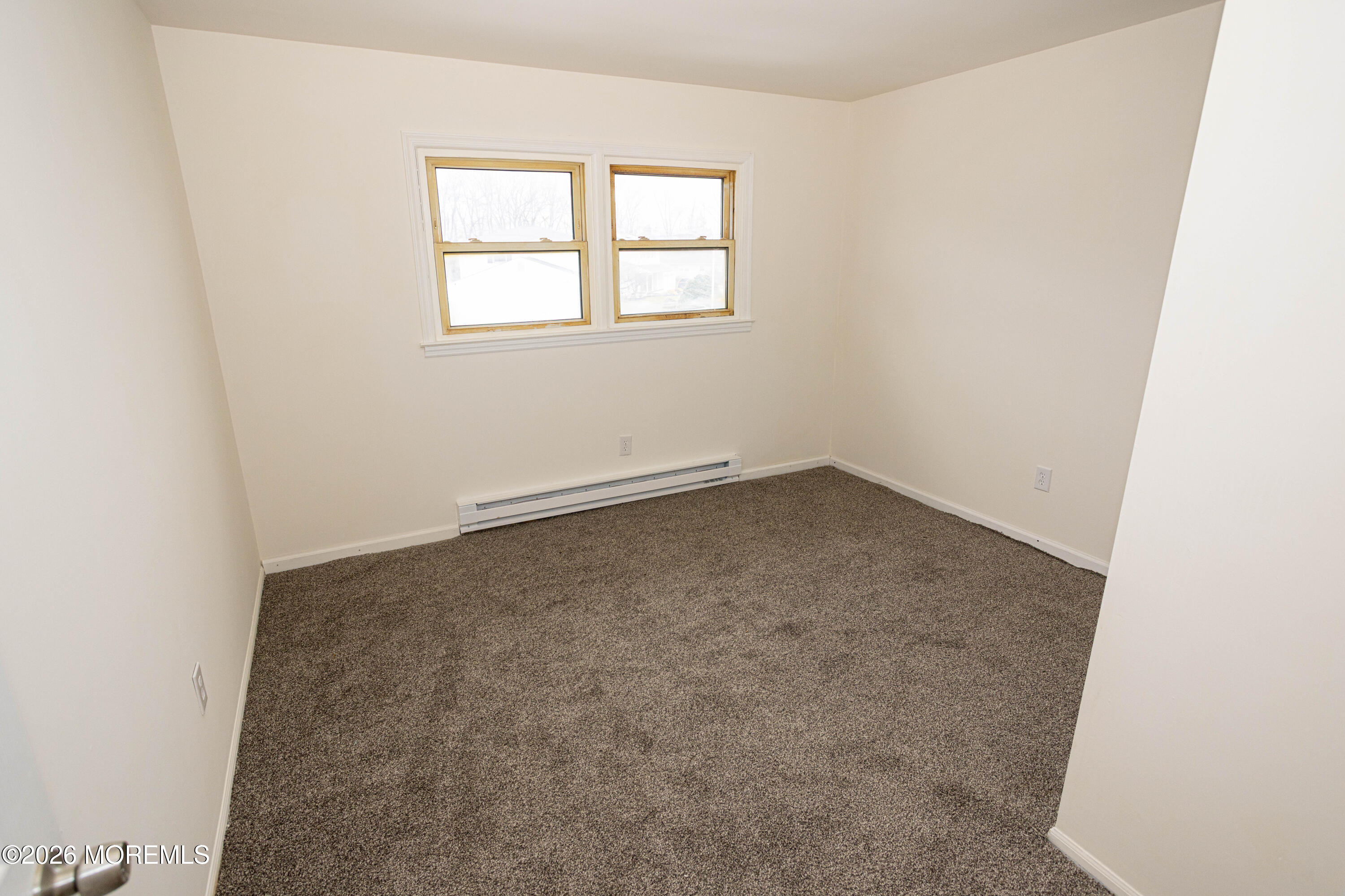 21 Sherwood Road Parlin, NJ 08859 - Photo 36 of 41 an empty room with a window