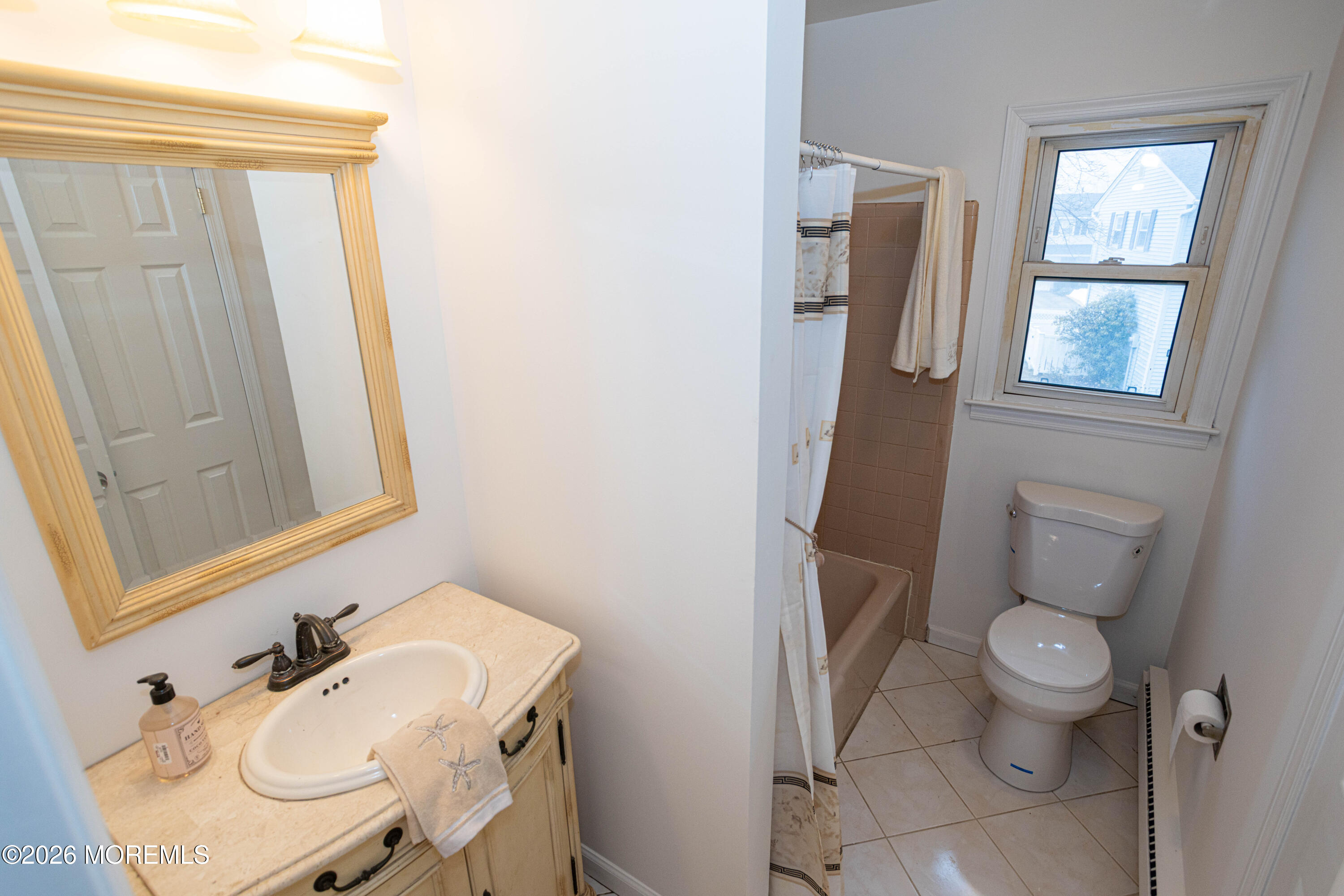 21 Sherwood Road Parlin, NJ 08859 - Photo 39 of 41 a bathroom with a sink toilet and shower