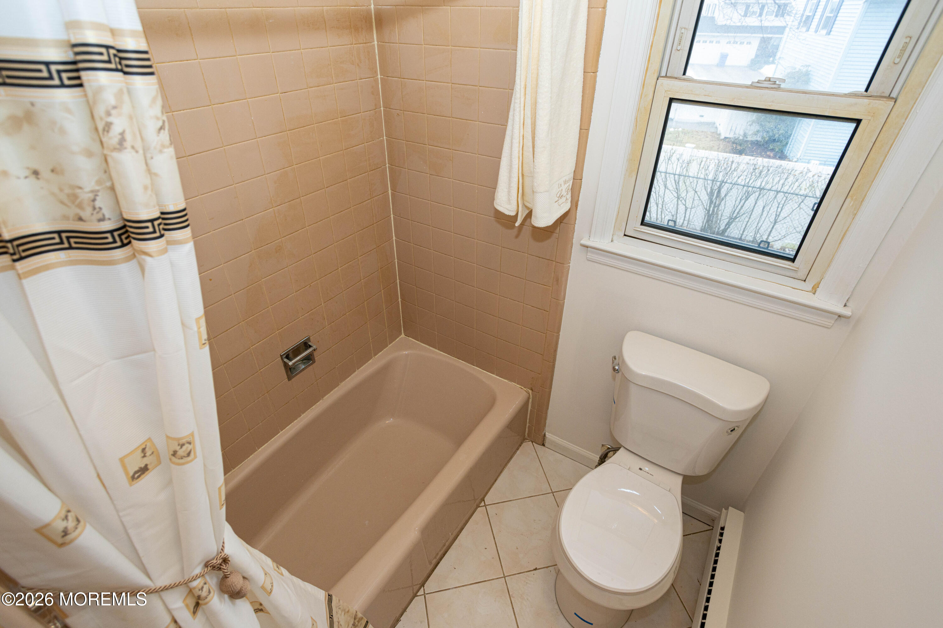 21 Sherwood Road Parlin, NJ 08859 - Photo 41 of 41 a white toilet sitting next to a small sink