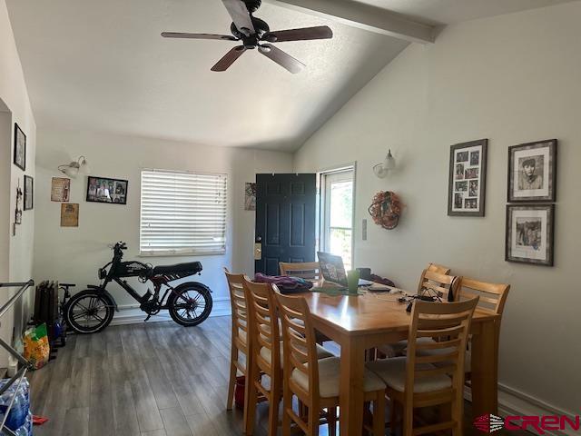 633 Alameda Cortez, CO 81321 - Photo 17 of 23 a view of a dining room with furniture and a window