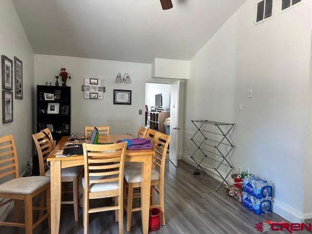 633 Alameda Cortez, CO 81321 - Photo 18 of 23 a view of a dining room with furniture and wooden floor