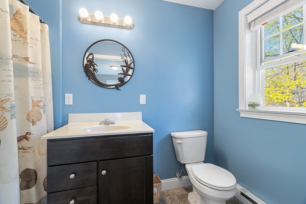 5 Powerstation Road Charlton, MA 01507 - Photo 12 of 21 a bathroom with a toilet a sink and a mirror