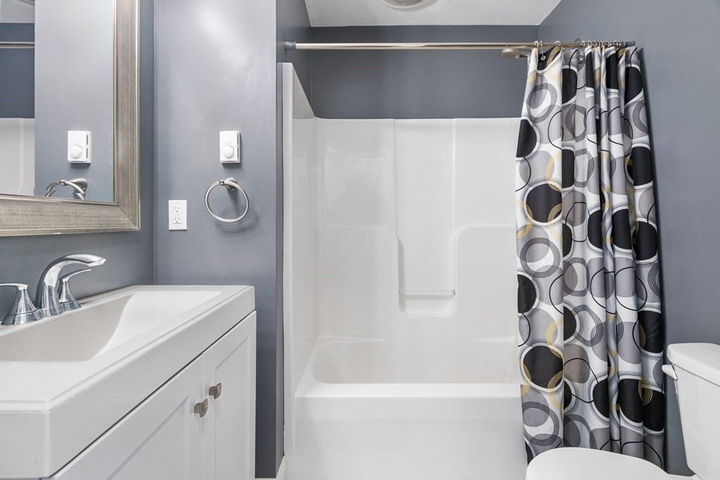 5 Powerstation Road Charlton, MA 01507 - Photo 15 of 21 a bathroom with a bathtub and shower