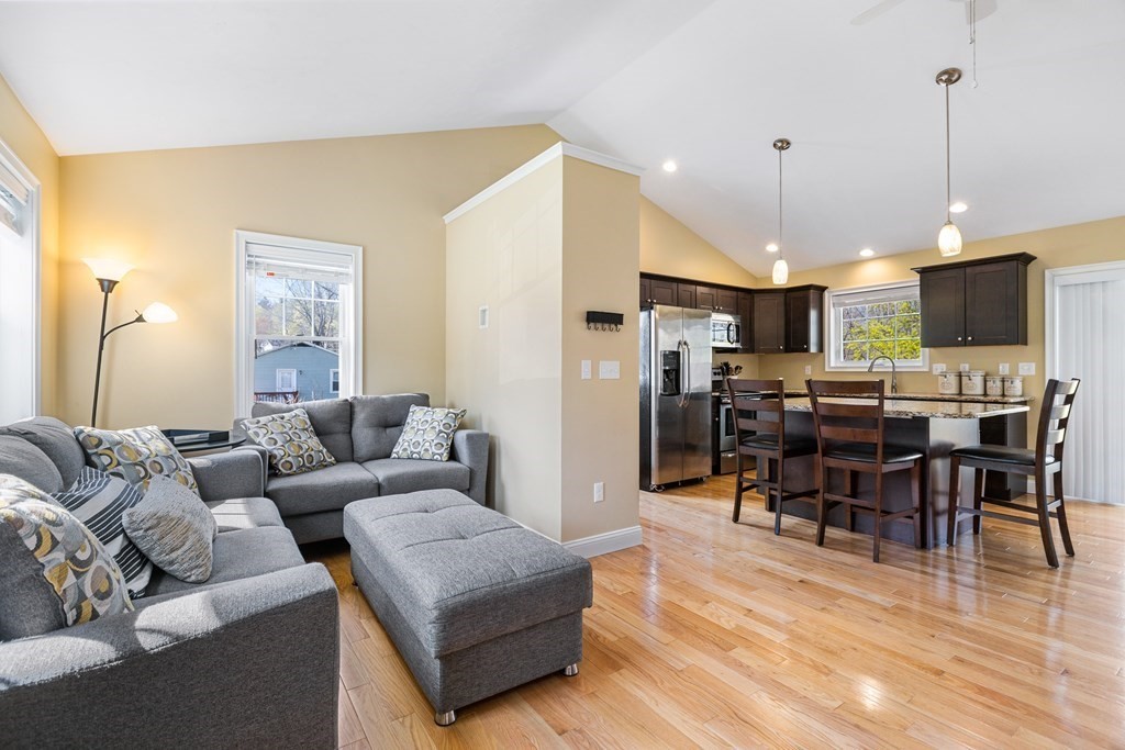 5 Powerstation Road Charlton, MA 01507 - Photo 5 of 21 a living room with furniture kitchen view and a large window