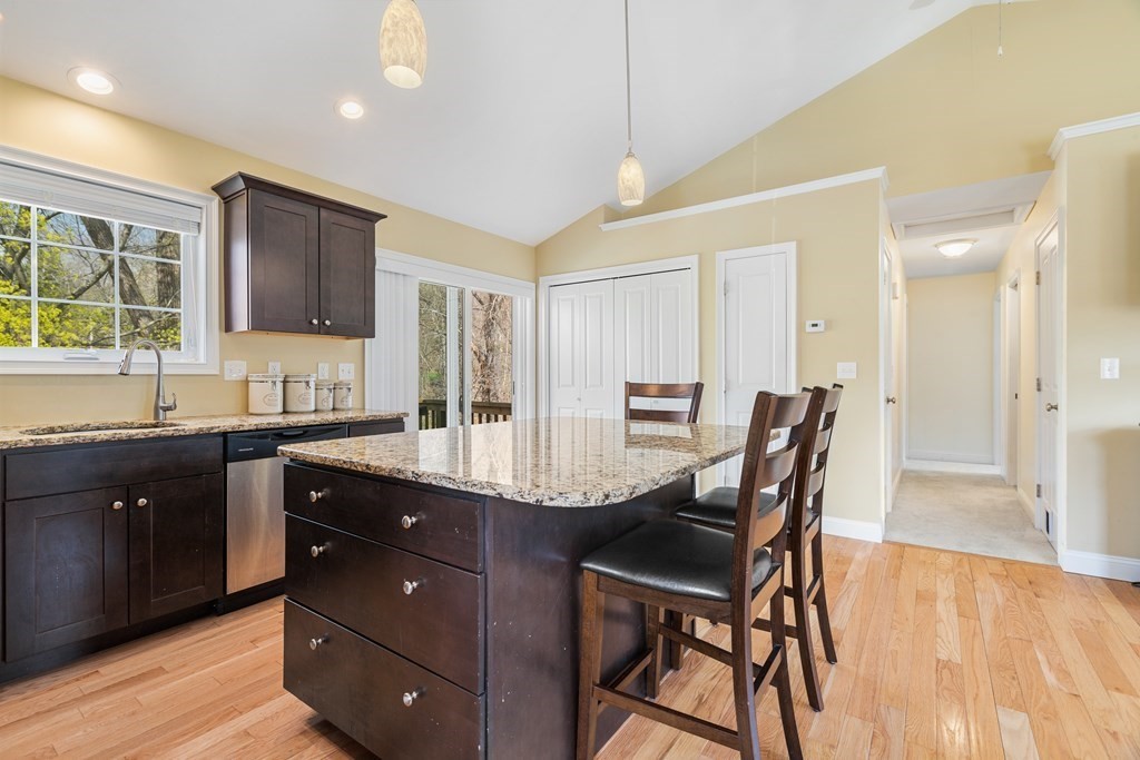 5 Powerstation Road Charlton, MA 01507 - Photo 10 of 21 a kitchen with a table chairs sink and cabinets