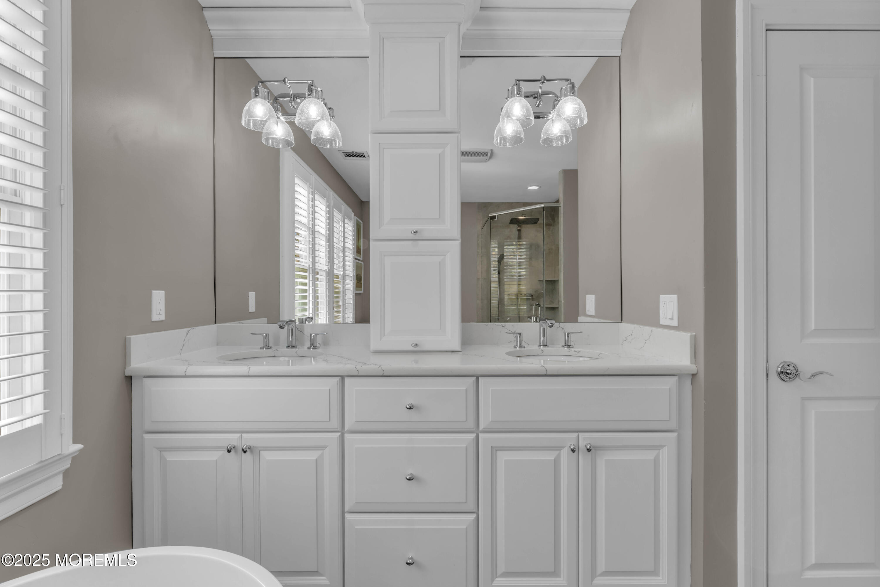1004 Cedar Lane Brielle, NJ 08730 - Photo 15 of 62 a bathroom with a sink and a mirror