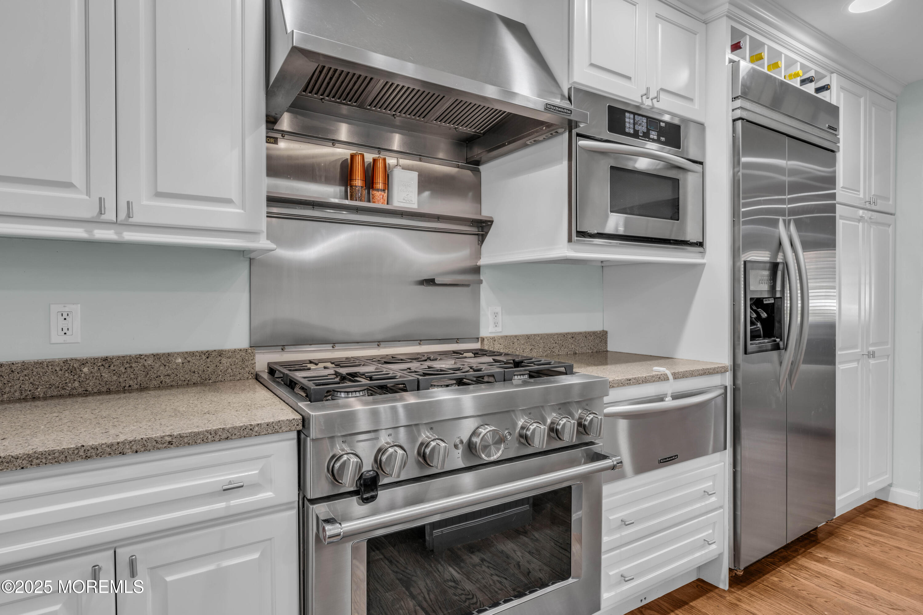 1004 Cedar Lane Brielle, NJ 08730 - Photo 18 of 62 a stove top oven sitting inside of a kitchen