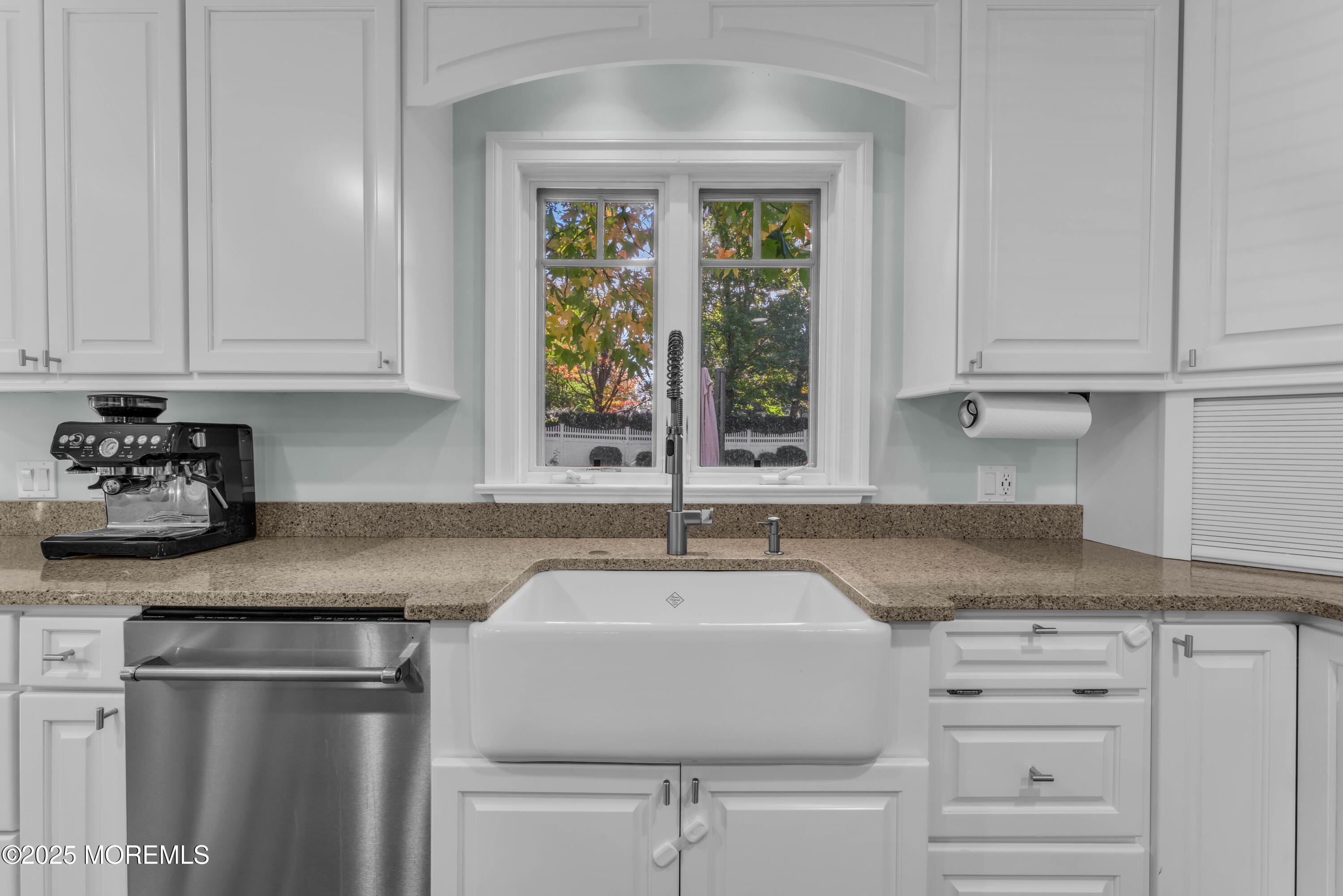 1004 Cedar Lane Brielle, NJ 08730 - Photo 19 of 62 a kitchen with appliances cabinets and a sink