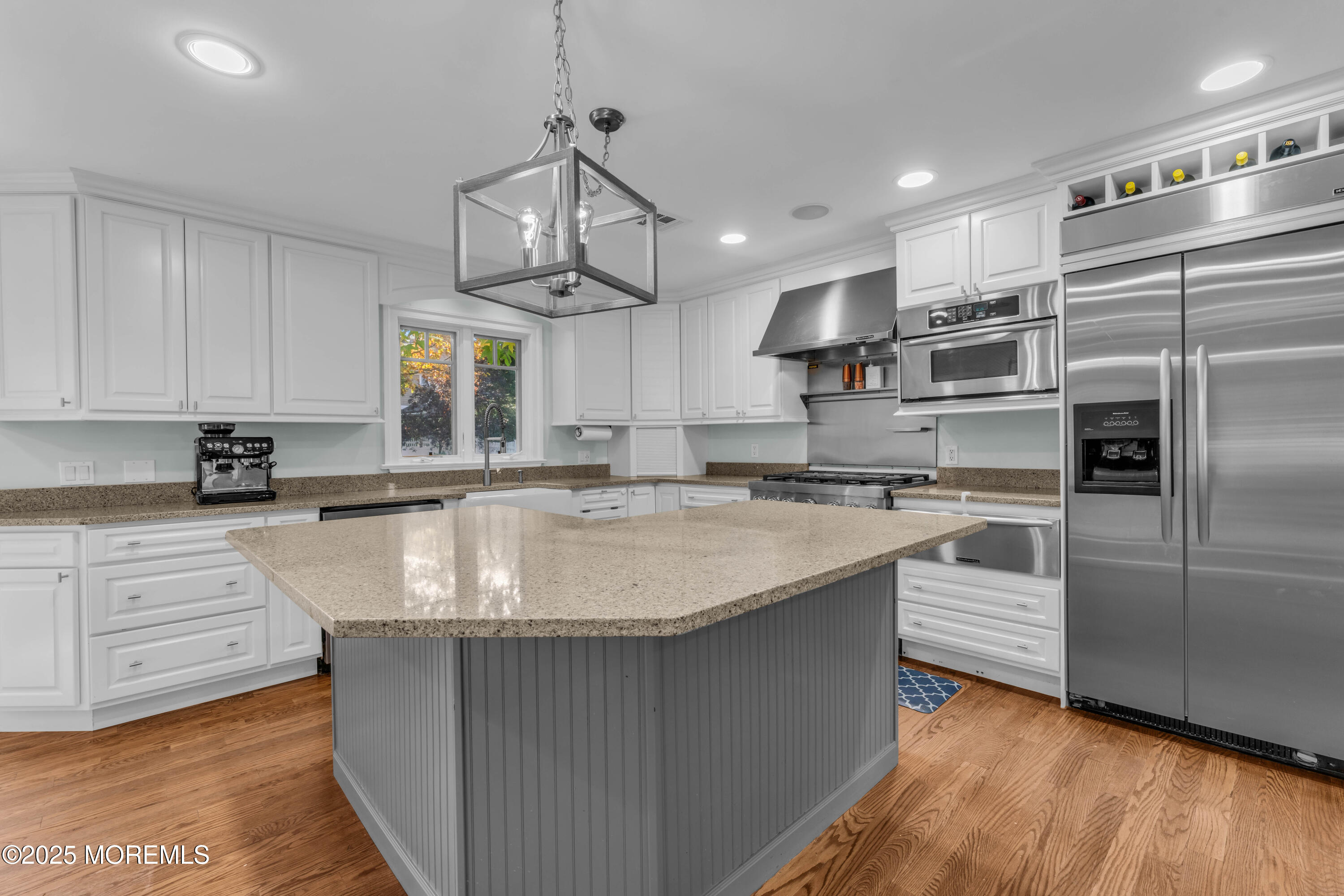 1004 Cedar Lane Brielle, NJ 08730 - Photo 20 of 62 a kitchen with stainless steel appliances granite countertop a sink a stove and a refrigerator