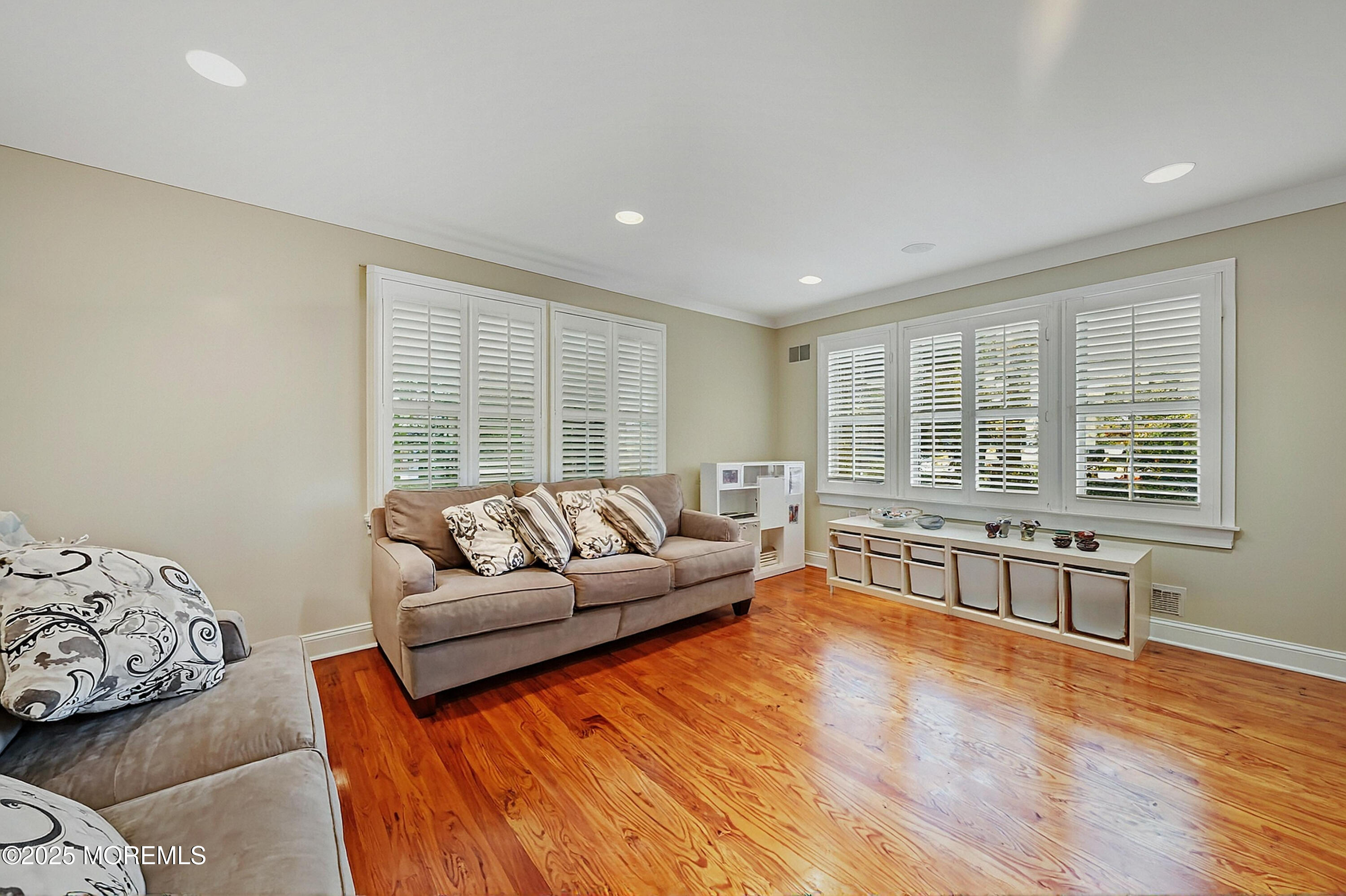 1004 Cedar Lane Brielle, NJ 08730 - Photo 22 of 62 a living room with furniture and windows