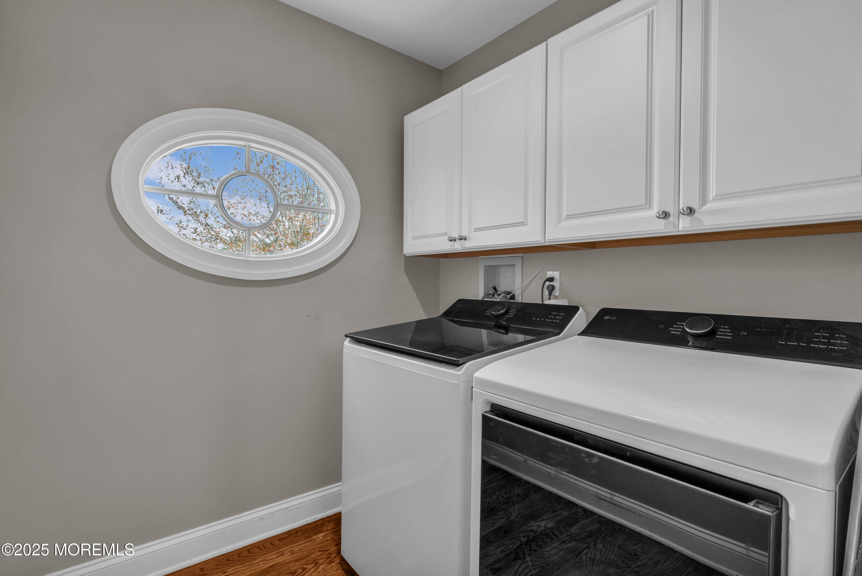 1004 Cedar Lane Brielle, NJ 08730 - Photo 27 of 62 a kitchen with a stove and a white cabinets