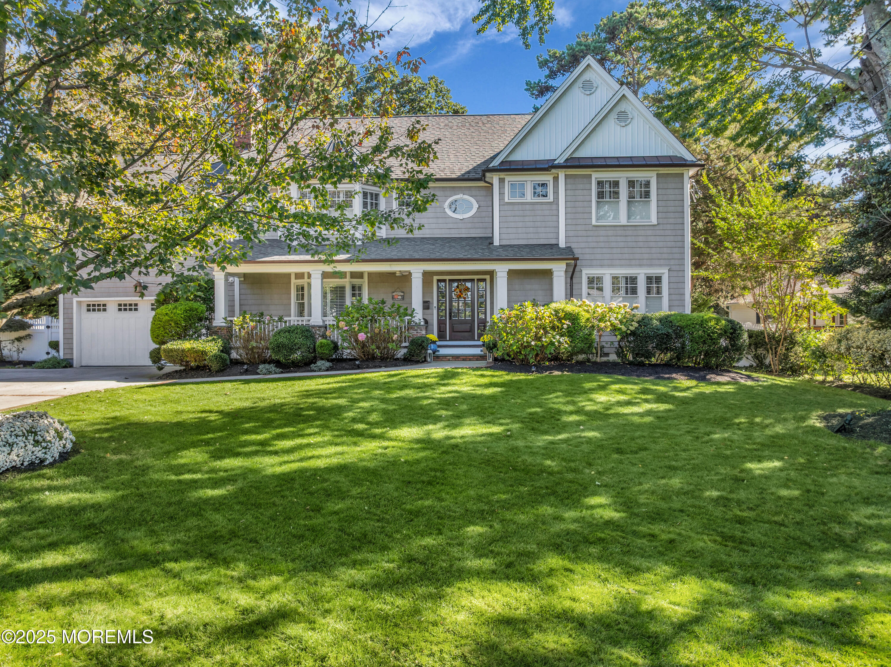 1004 Cedar Lane Brielle, NJ 08730 - Photo 3 of 62 a front view of house with yard and green space