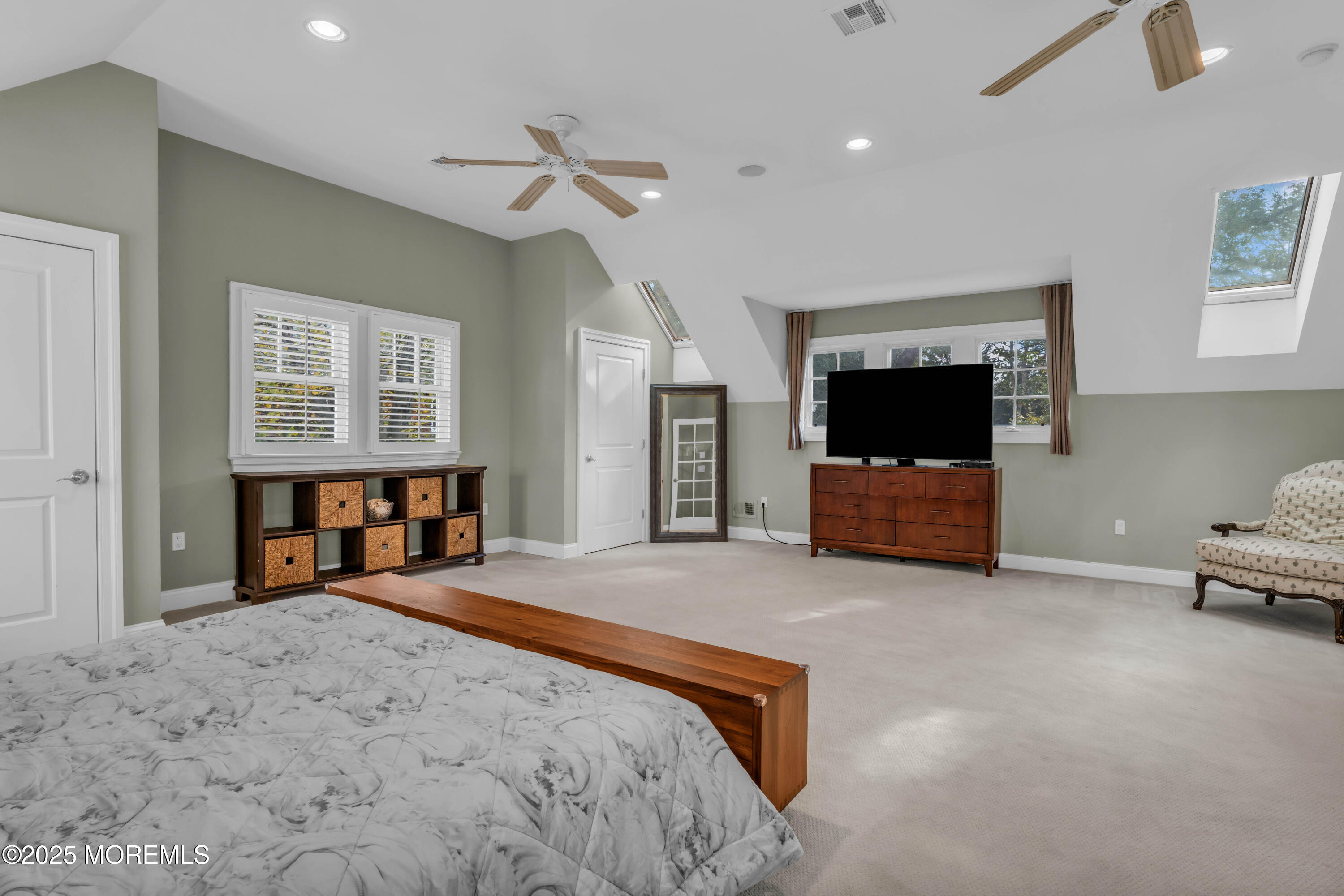 1004 Cedar Lane Brielle, NJ 08730 - Photo 34 of 62 a spacious bedroom with a bed and a television