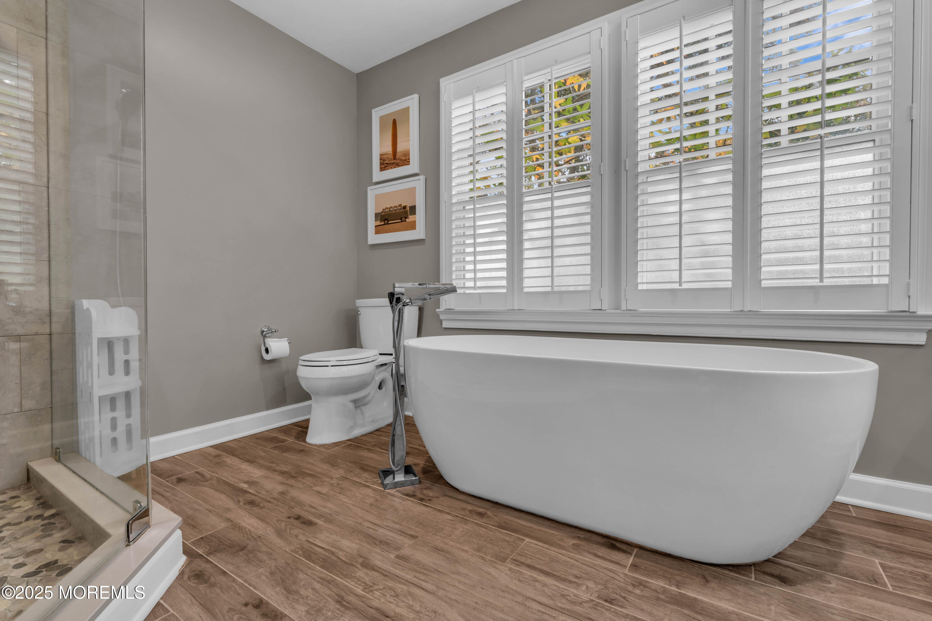 1004 Cedar Lane Brielle, NJ 08730 - Photo 37 of 62 a living room with a toilet and a window