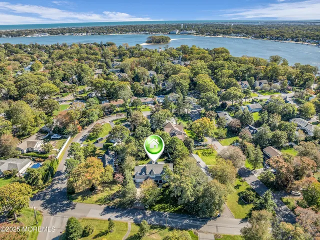 a front view of a house with outdoor seating
