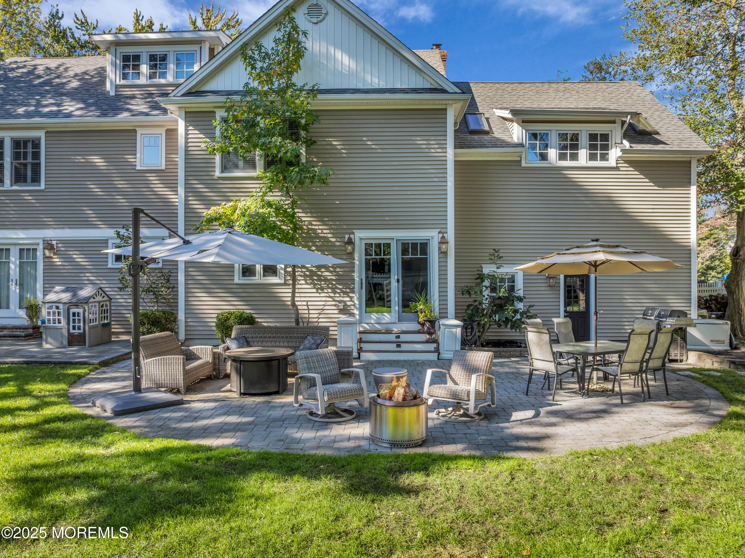 1004 Cedar Lane Brielle, NJ 08730 - Photo 50 of 62 a view of a house with backyard