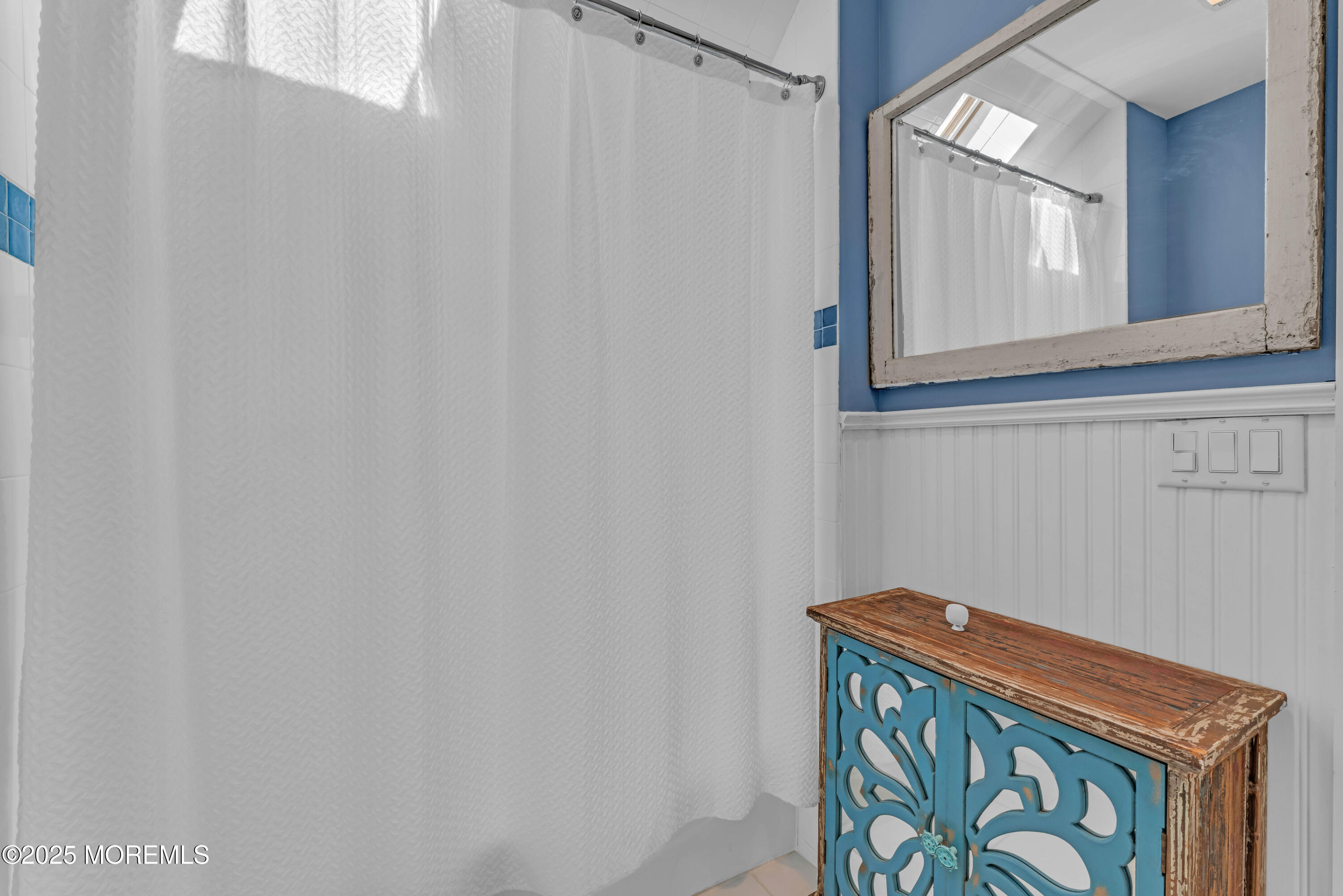 1004 Cedar Lane Brielle, NJ 08730 - Photo 52 of 62 a view of a small space with wooden floor and a window