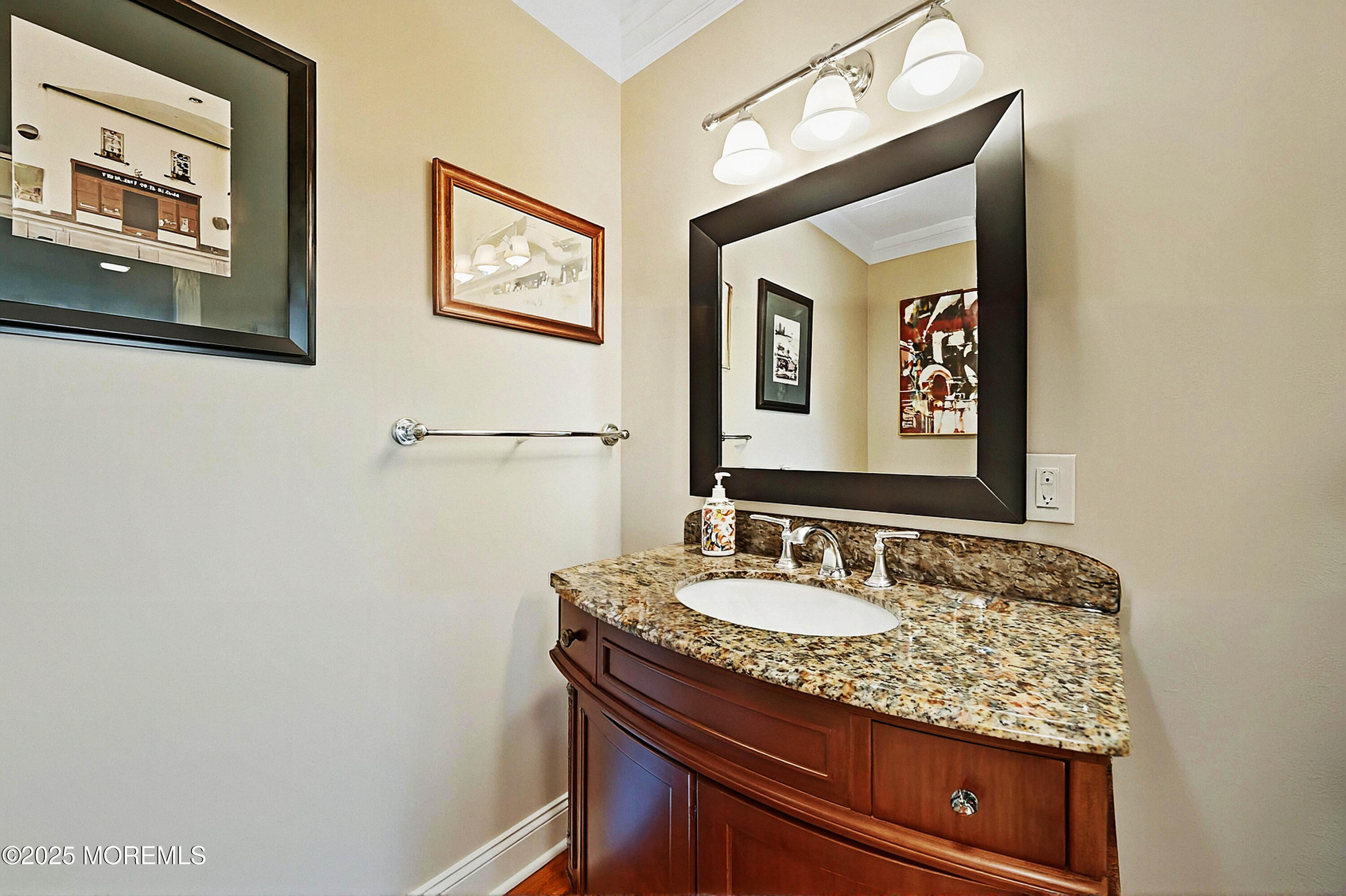 1004 Cedar Lane Brielle, NJ 08730 - Photo 9 of 62 a bathroom with a sink and a mirror