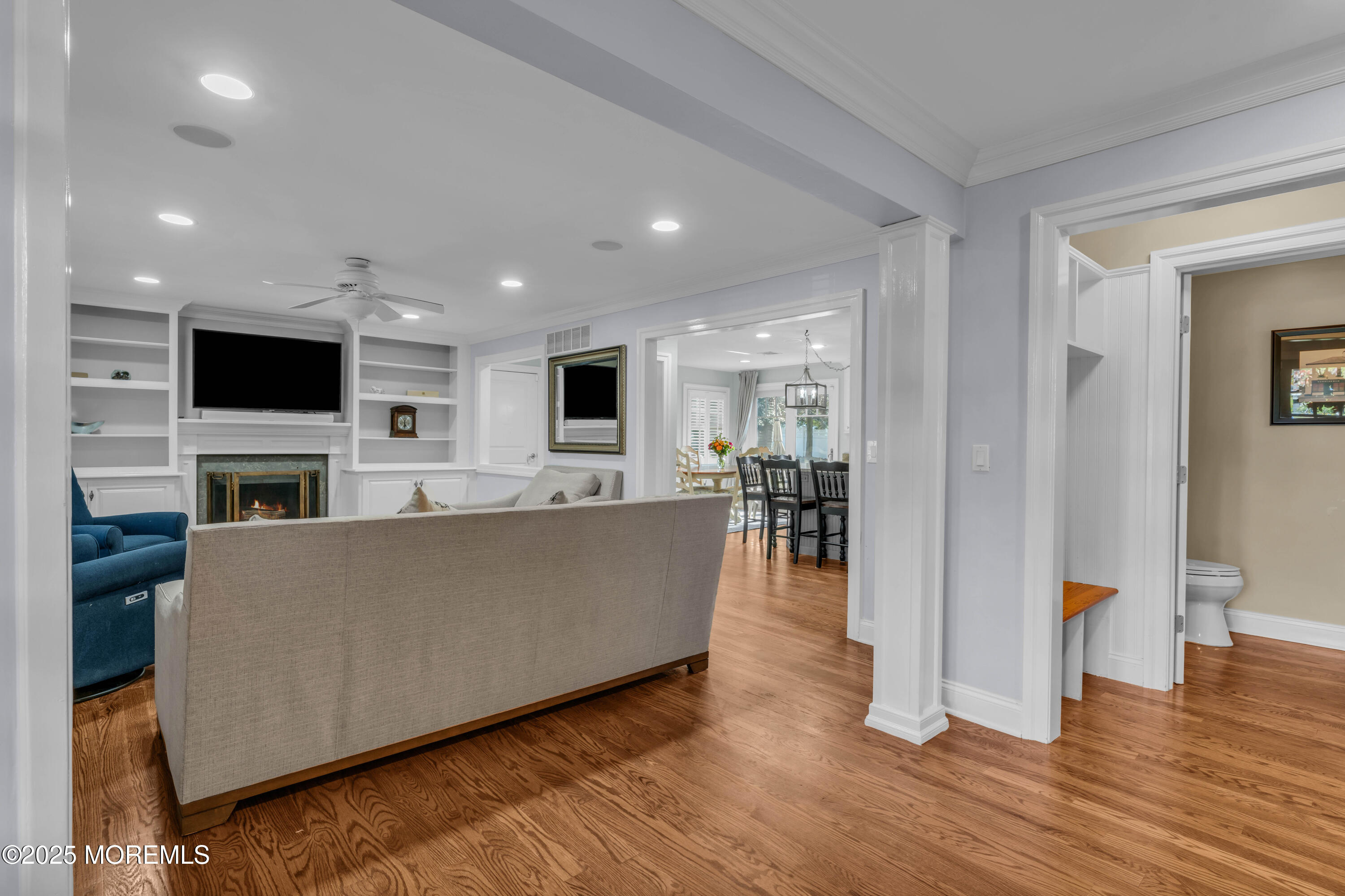 1004 Cedar Lane Brielle, NJ 08730 - Photo 10 of 62 a living room with furniture and a fireplace