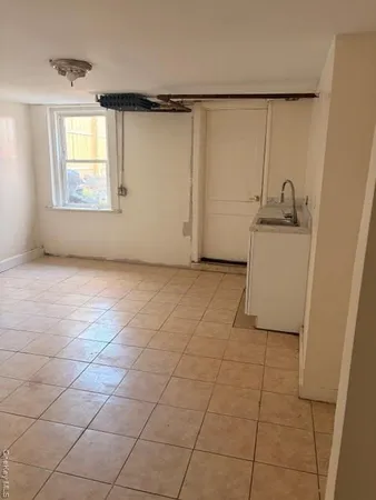 a view of a storage & utility room in a house